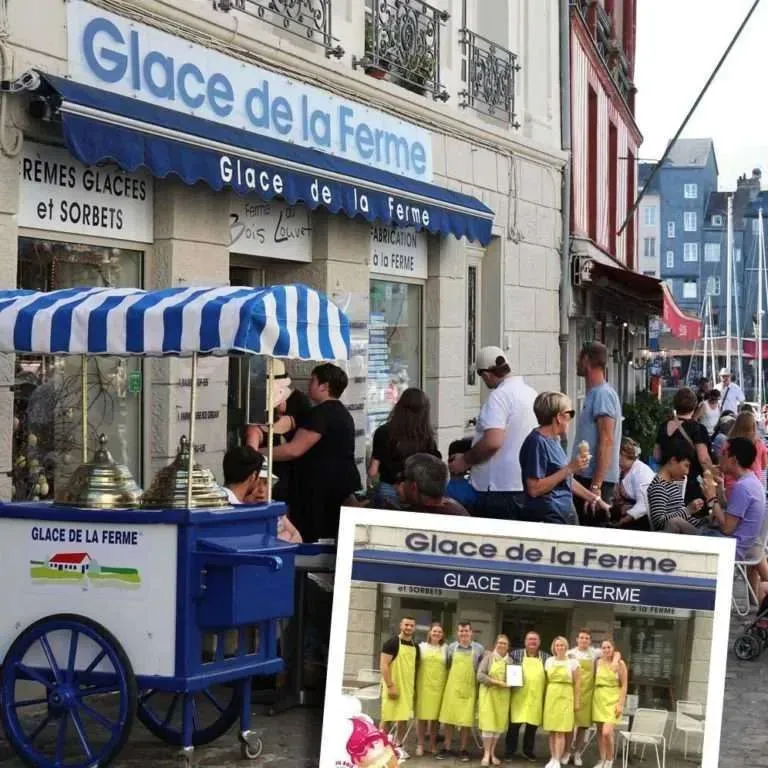 An ice cream cart visible outside while ice cream is being sold to customers.